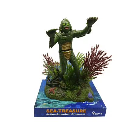 Aquarium decoration of a monster with open mouth and textured body